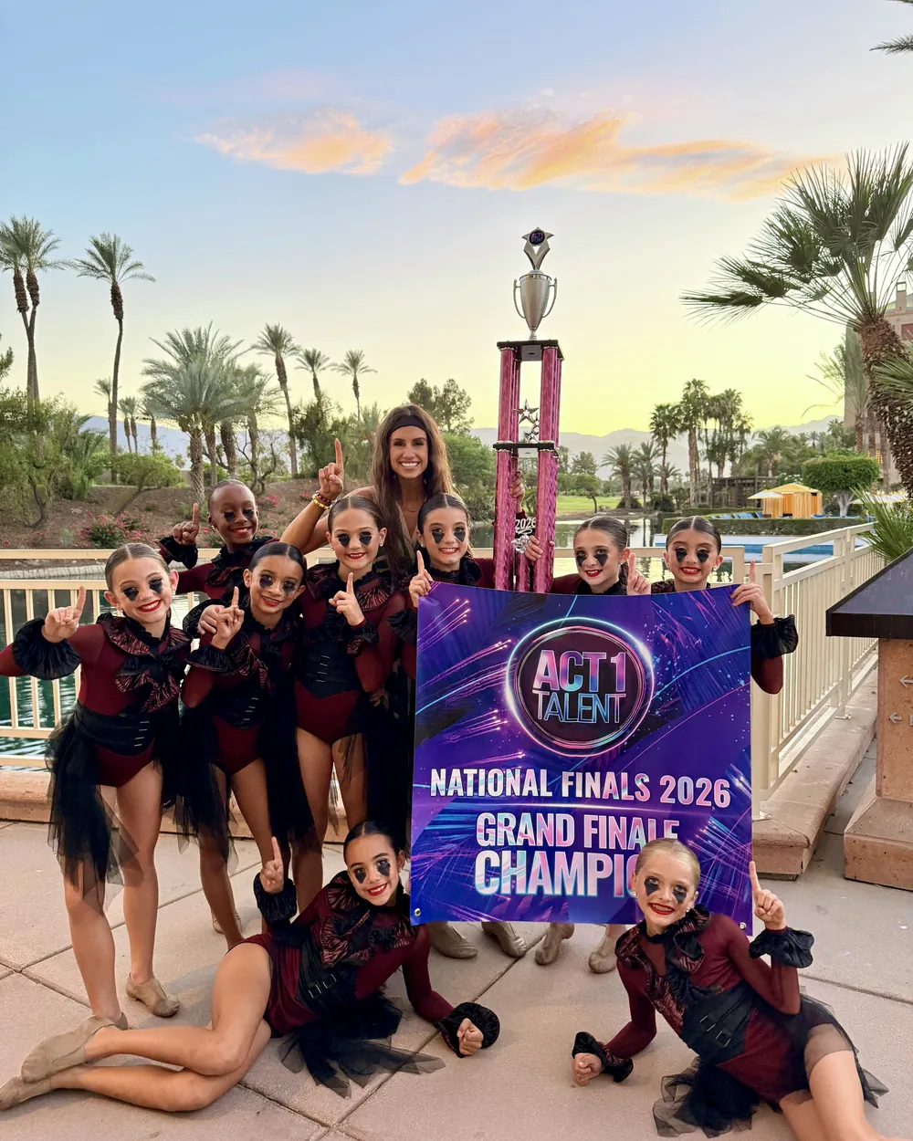 The MSDC competition team with their trophy and National Finals Grand Finale Champion banner